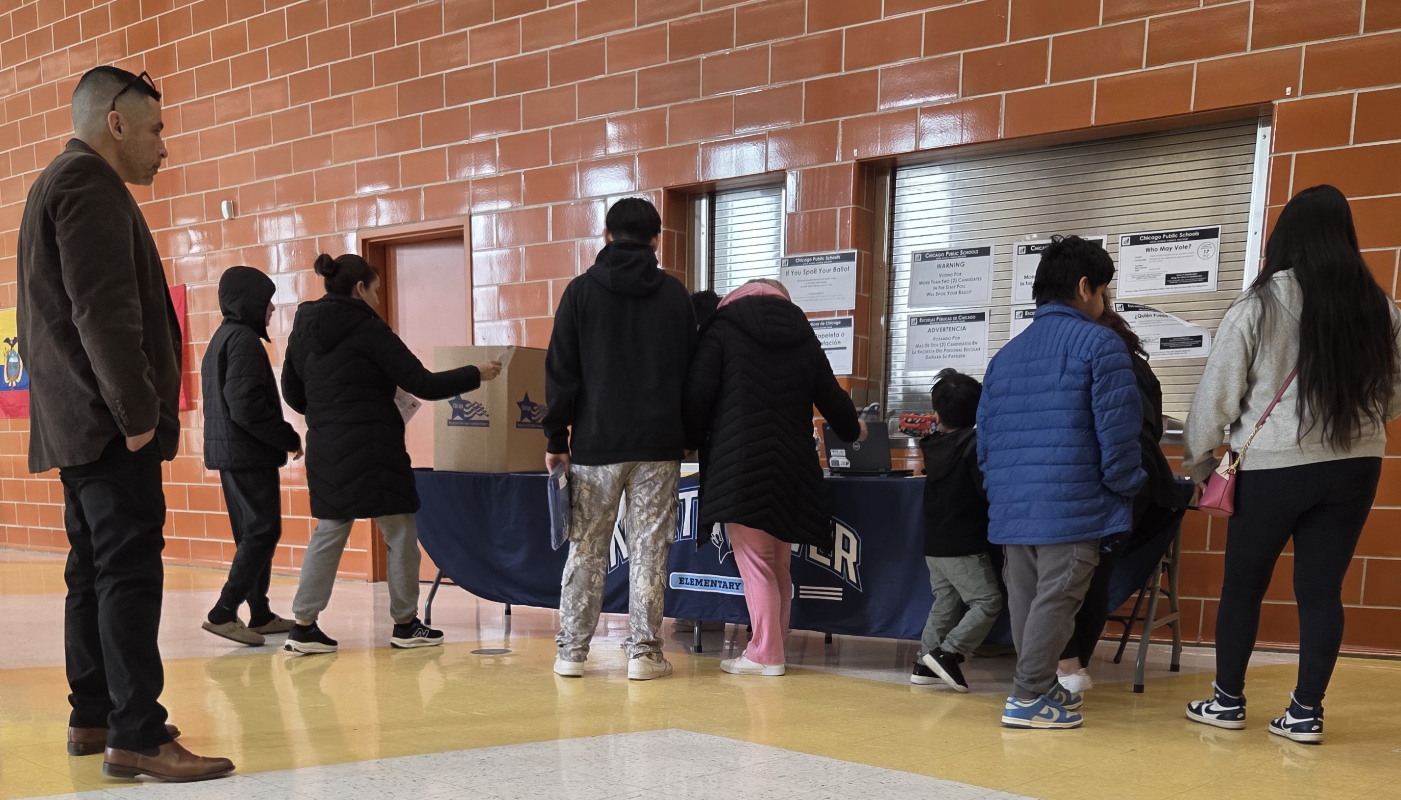 Jaime Sanchez watches voters sign in at North River’s LSC election on Wednesday, March 18, 2026